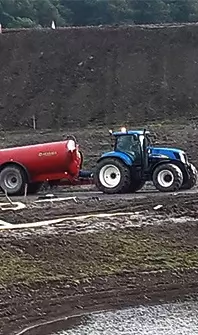 tractor with a vacuum tanker