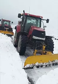 tractor clearing snow